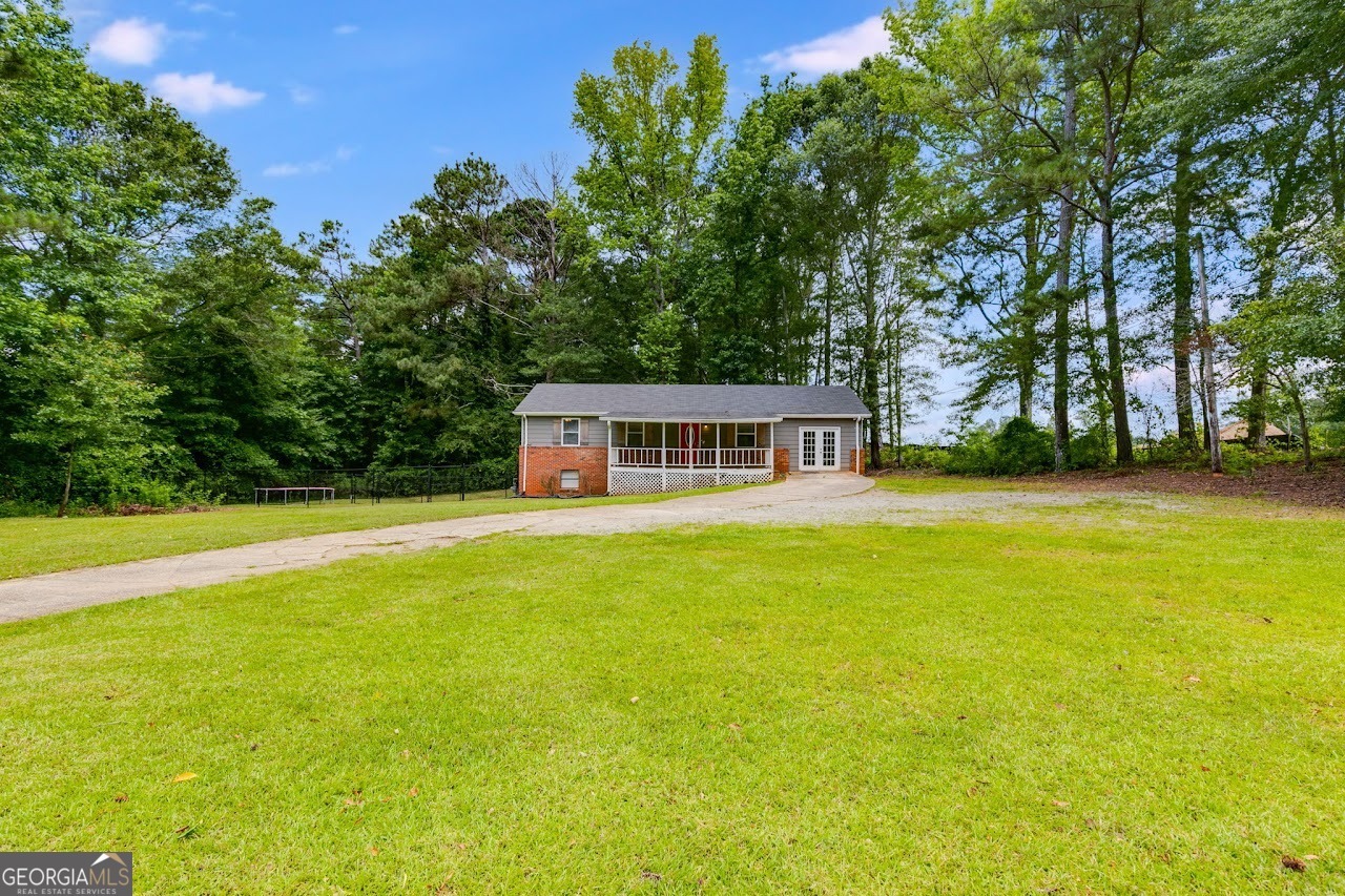 Property Photo:  2961 W Hwy 166  GA 30117 