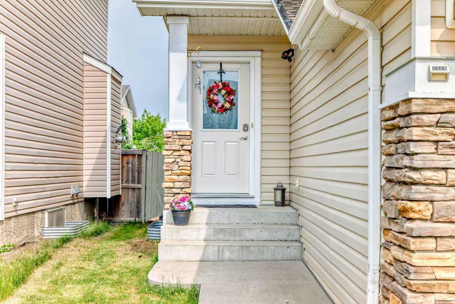 Property Photo: 239 Cougar Plateau Way SW AB T3H 5S2