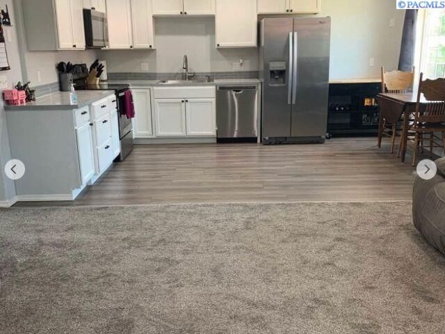 Property Photo:  526 S 40th Ave #D-210  WA 99353 