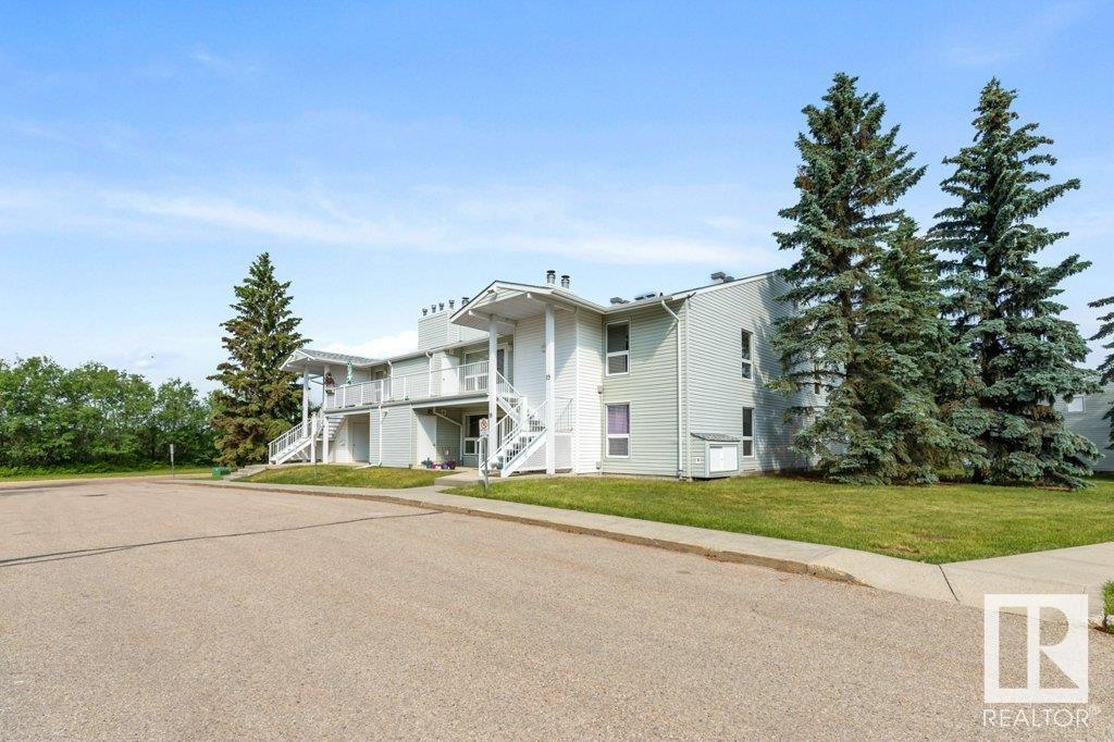 Property Photo: 2115 118 Street NW 19 AB T6J 5N1