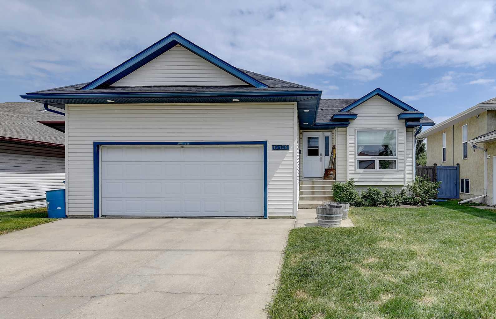 Property Photo: 12109 105 Street AB T8V 7N2