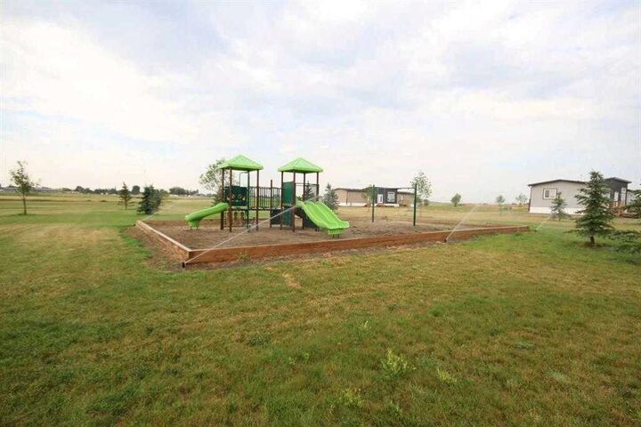 Photo de la propriété: 4810 72 Ave. AB T1G 2A2
