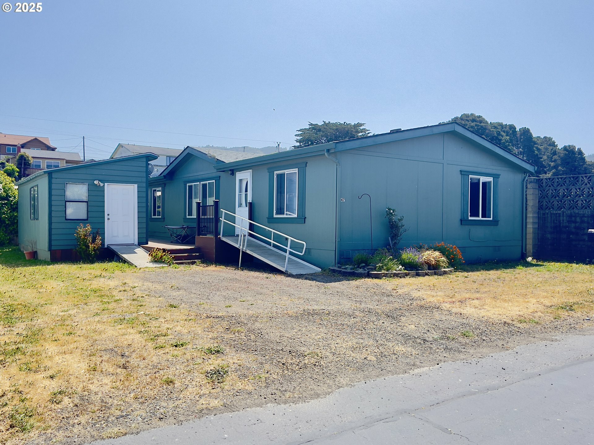 Property Photo: 94120 Strahan St 47 OR 97444