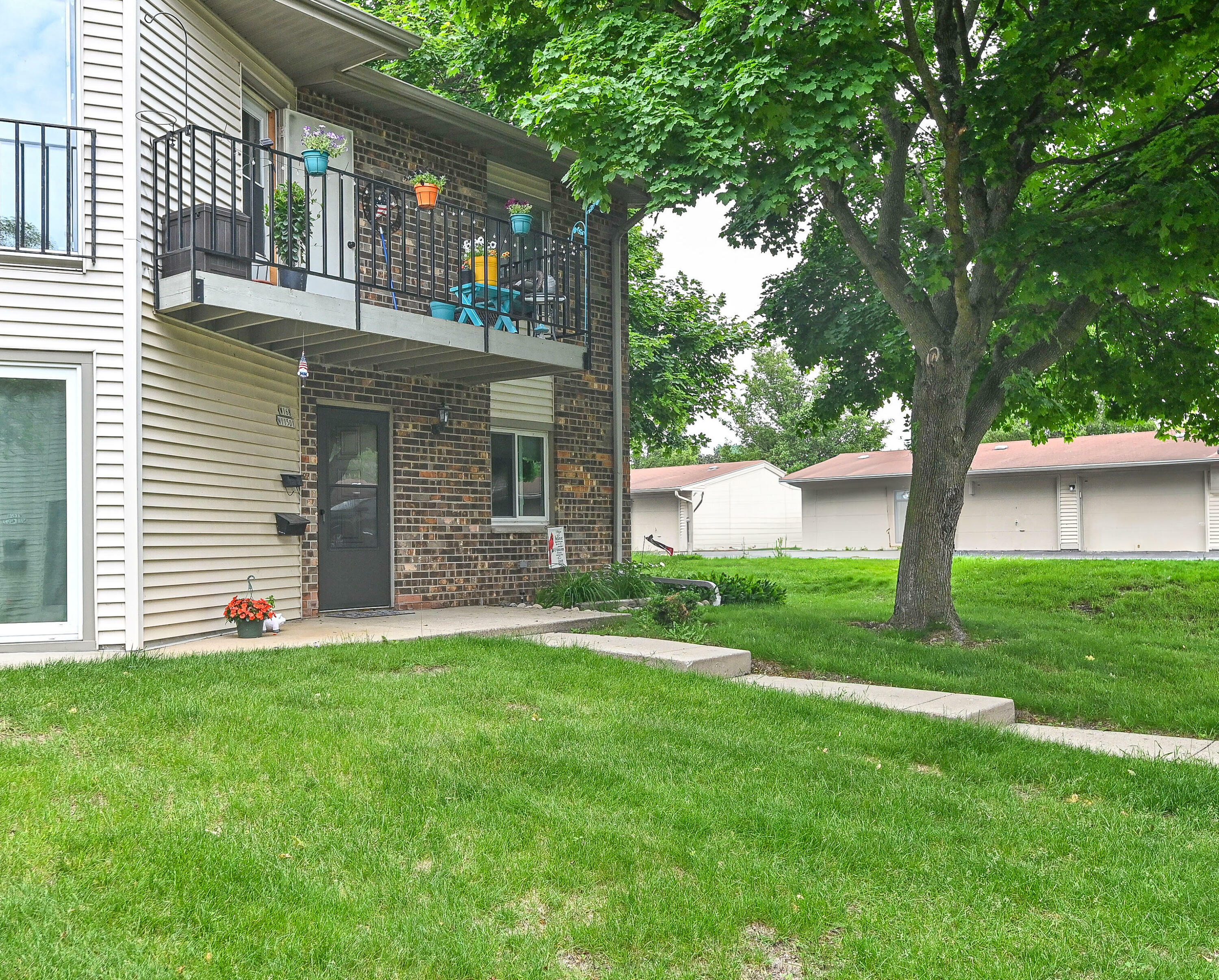 Property Photo:  W168n11501 El Camino Dr 2  WI 53022 