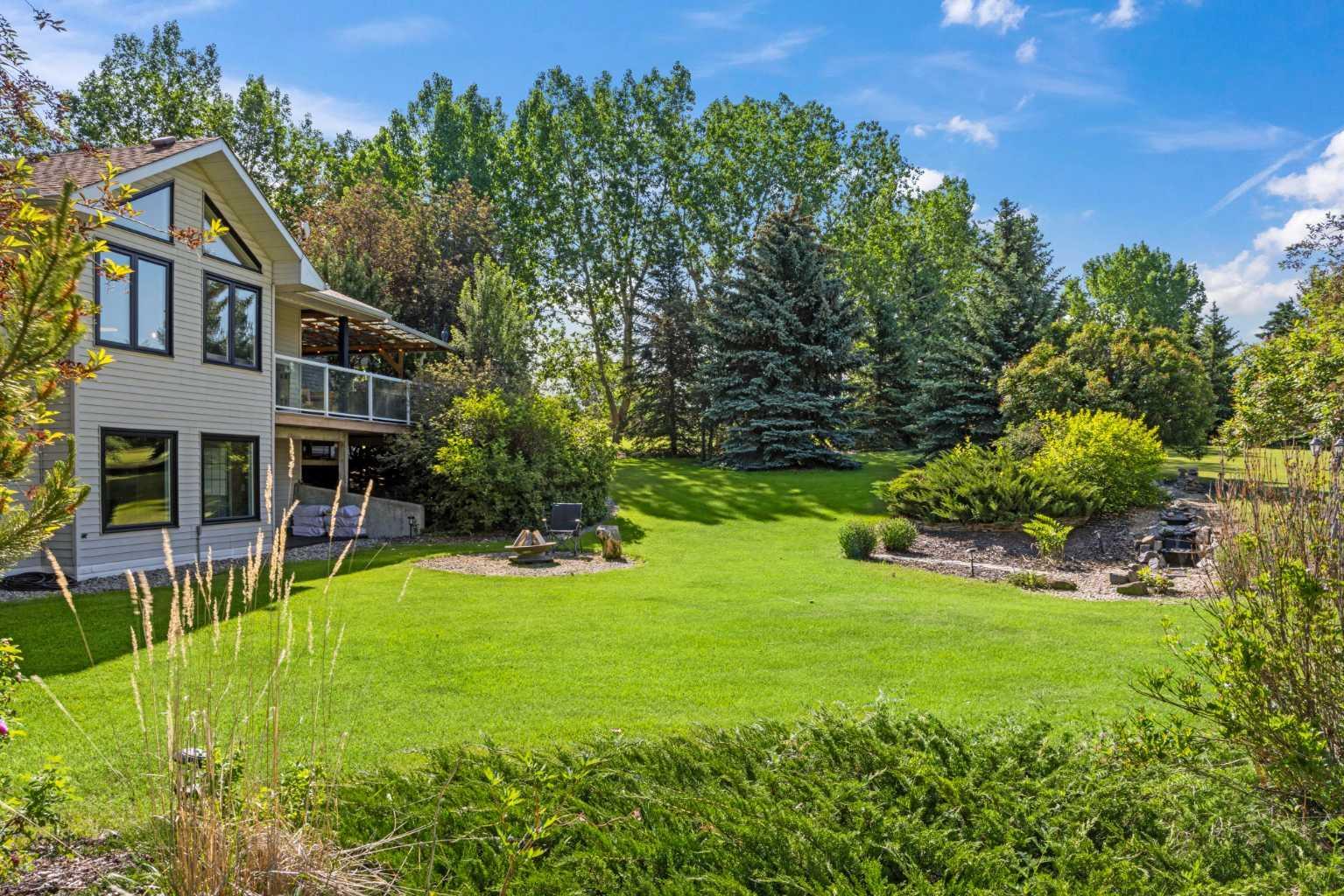 Property Photo: 80057 Highwood Meadows Drive E AB T1S 4Y9