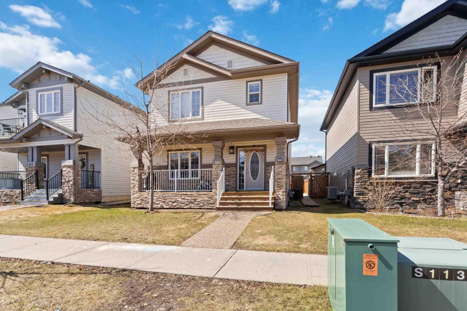 Property Photo: 144 Huberman Way AB T9K 0Z9