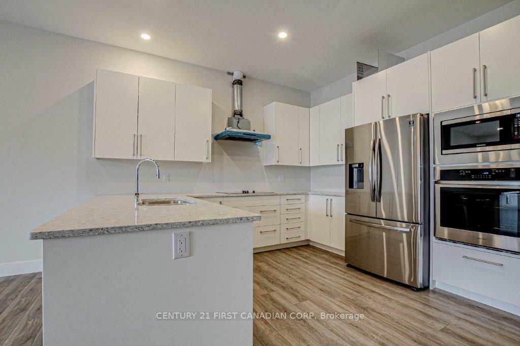 Property Photo: 1696 Fiddlehead Place 205 ON N6G 5M6