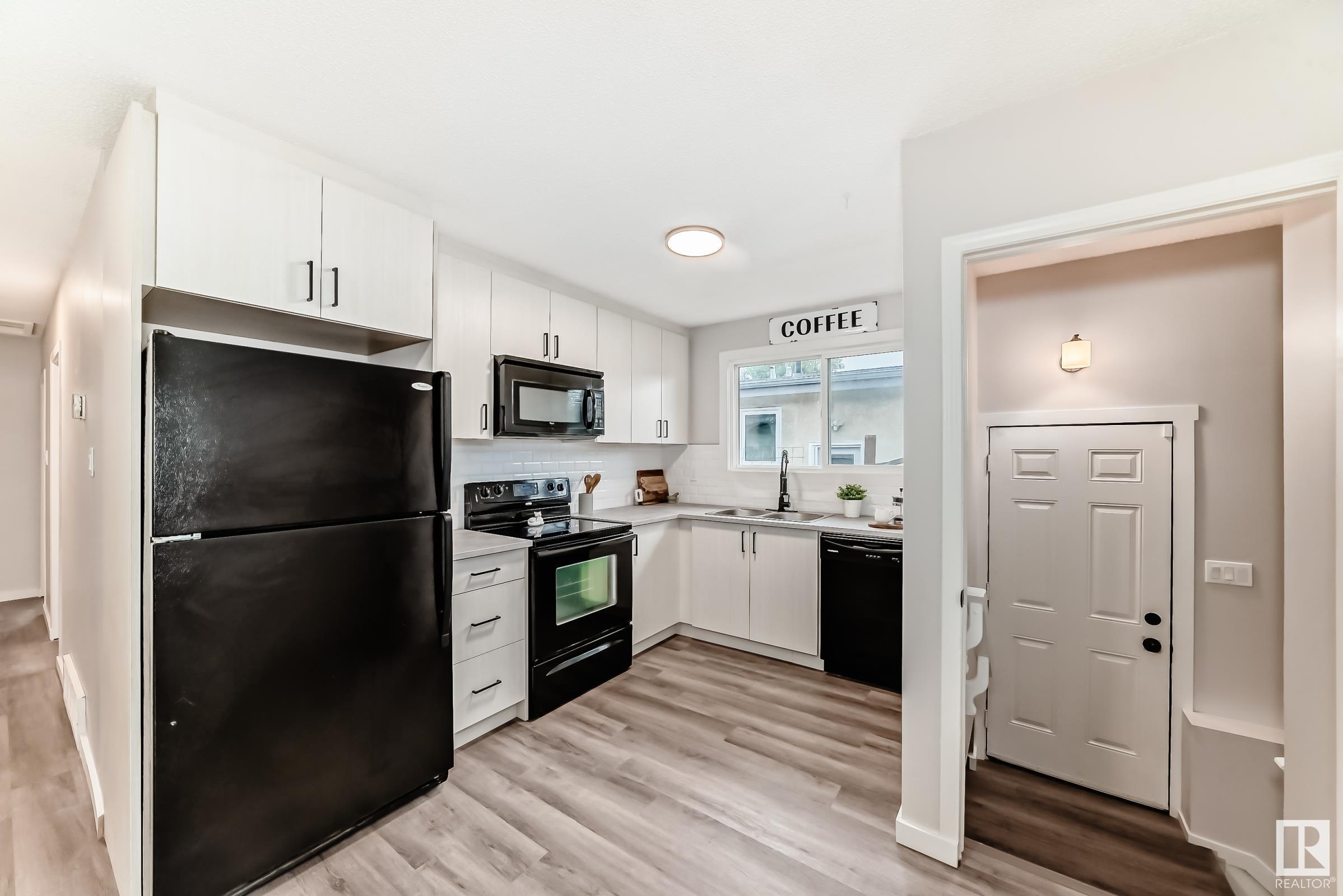 Property Photo:  8405 134 Avenue NW  AB T5E 1G4 