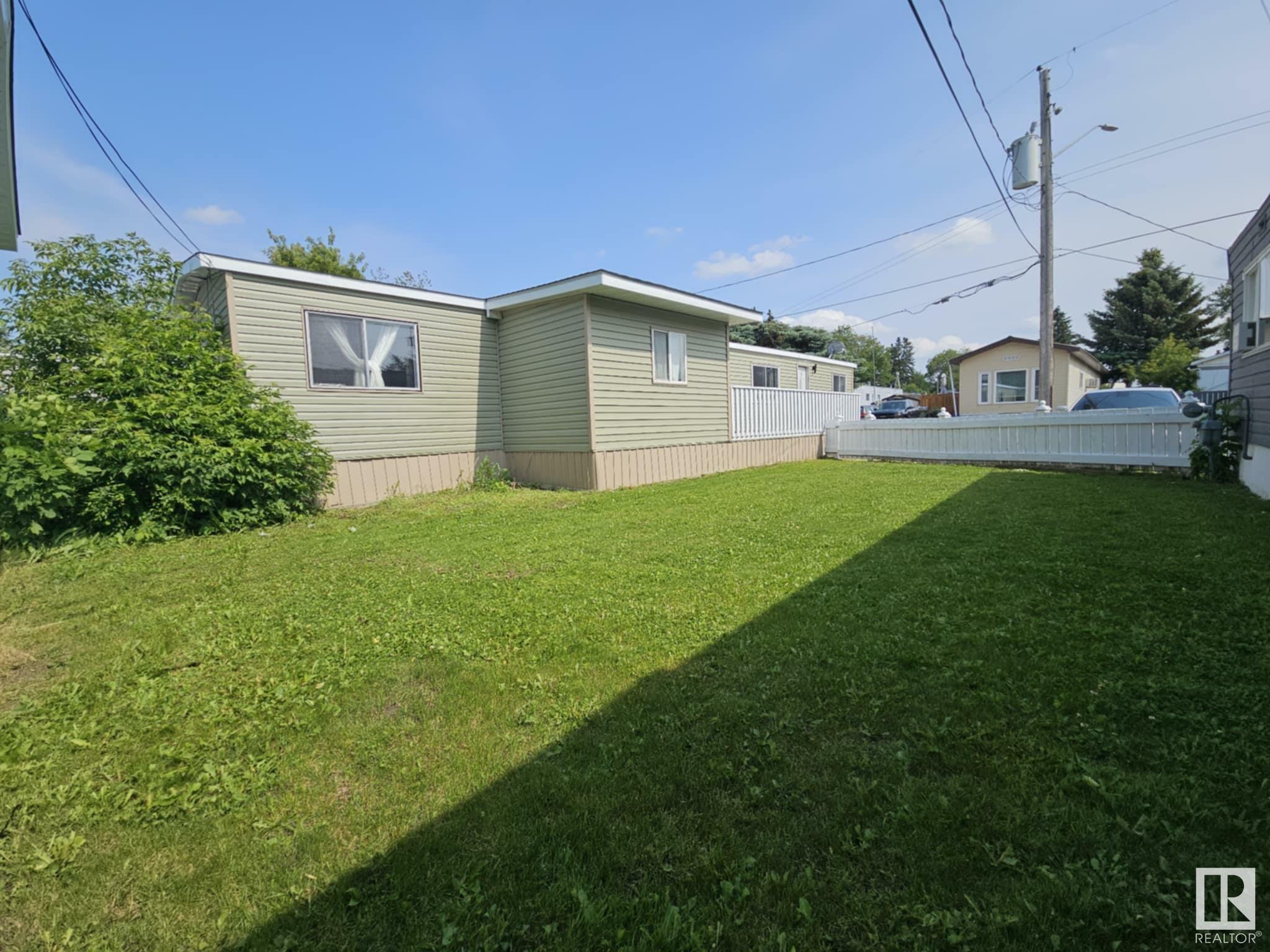Property Photo: #111 305 Calahoo Rd AB T7X 3K7