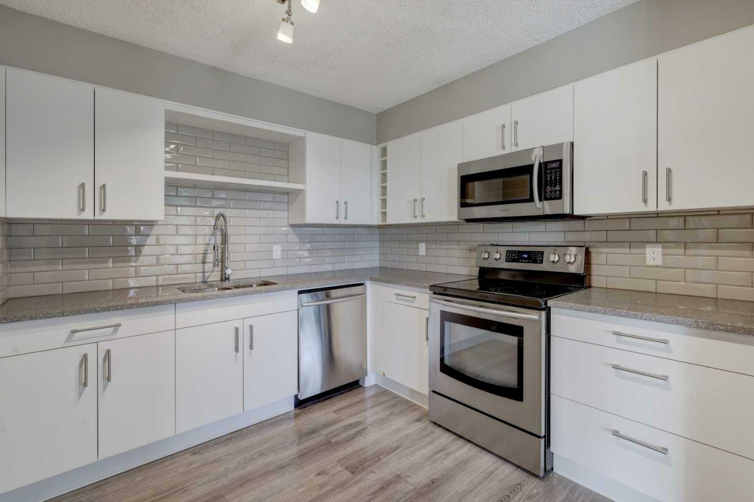 Property Photo: 145 Point Drive NW 405 AB T3B 4W1