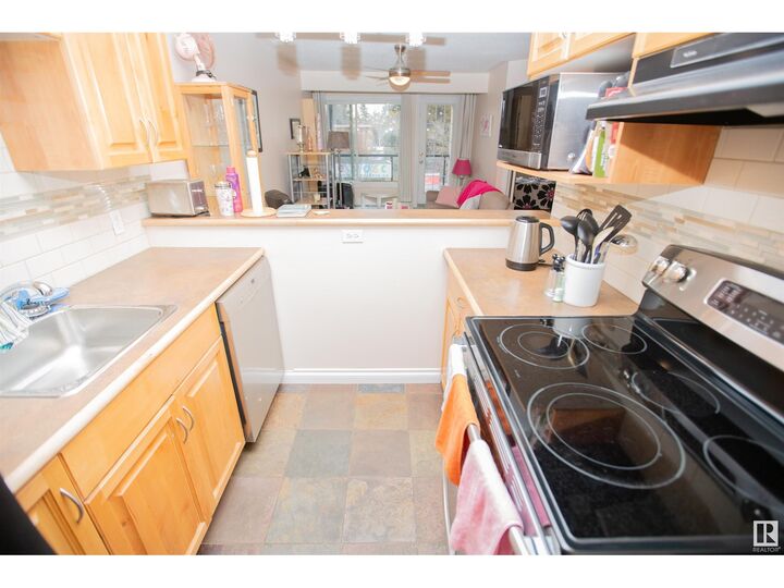 Property Photo:  #213 11033 127 St NW  AB T5M 0T3 