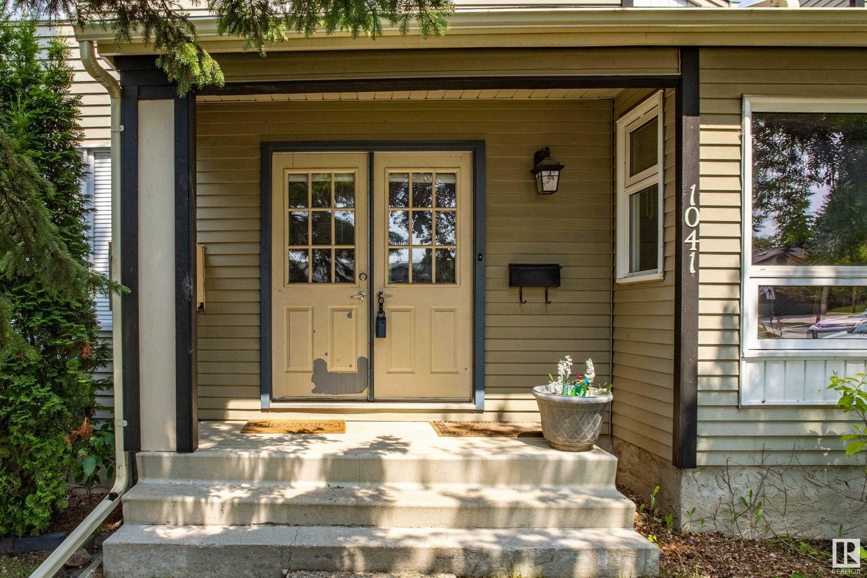 Property Photo: 1041 Village Drive AB T8A 4L4