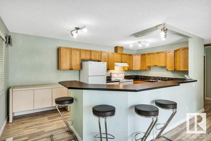 Property Photo:  10909 106 Street NW 24  AB T5H 4M7 