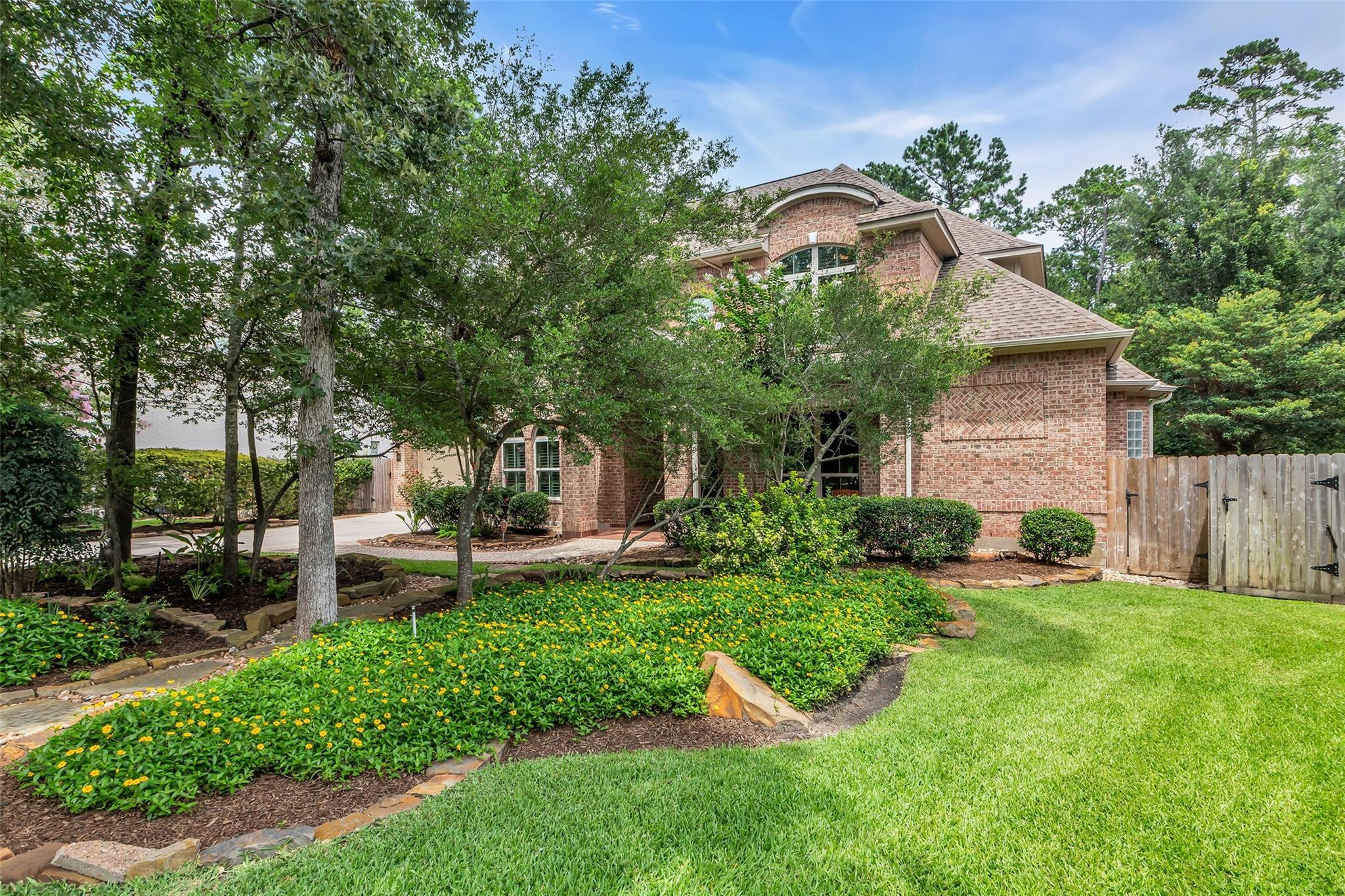 Property Photo:  130 Amulet Oaks Court  TX 77382 