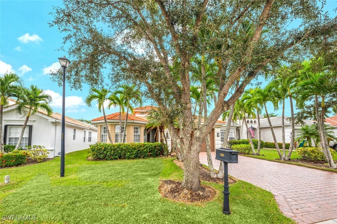 Property Photo: 5583 Lago Villaggio Way FL 34104