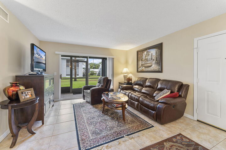 Property Photo: 112 SE Village Drive 112 FL 34952