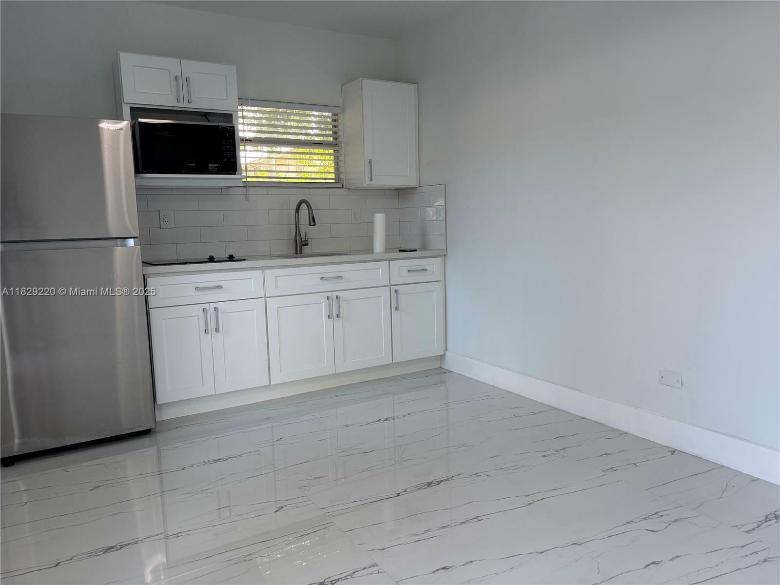 Property Photo:  214 NW 46th Ave 214  FL 33126 