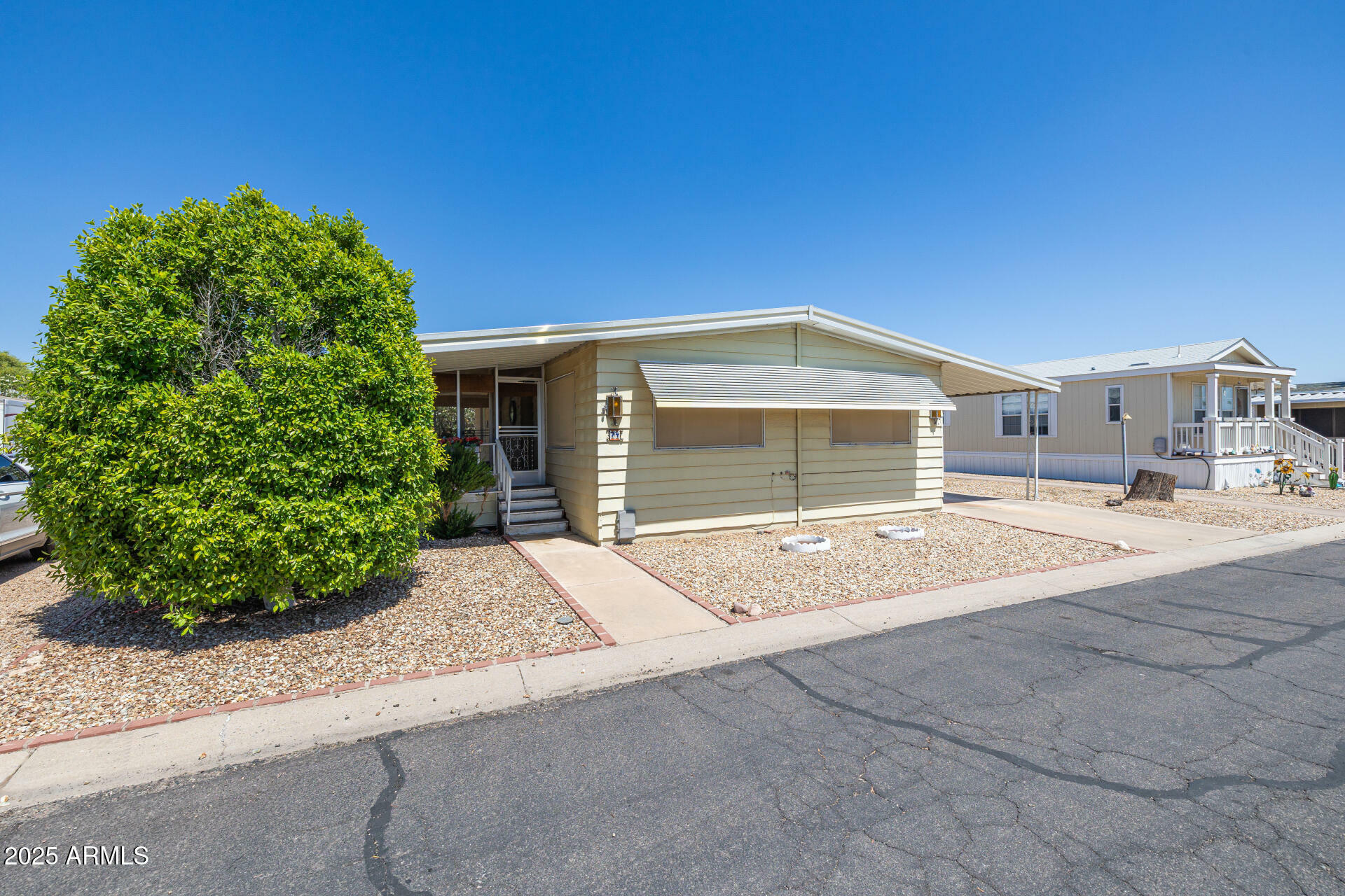 Property Photo: 6960 W Peoria Avenue 74 AZ 85345
