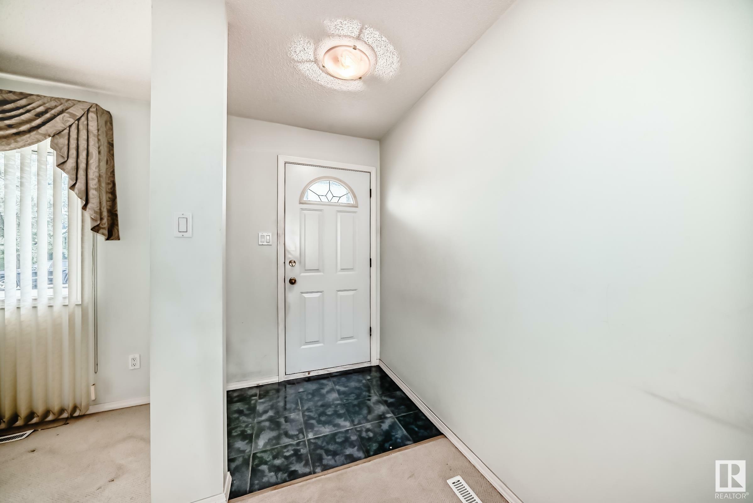 Property Photo: 8907 138 Avenue NW AB T5E 2A7