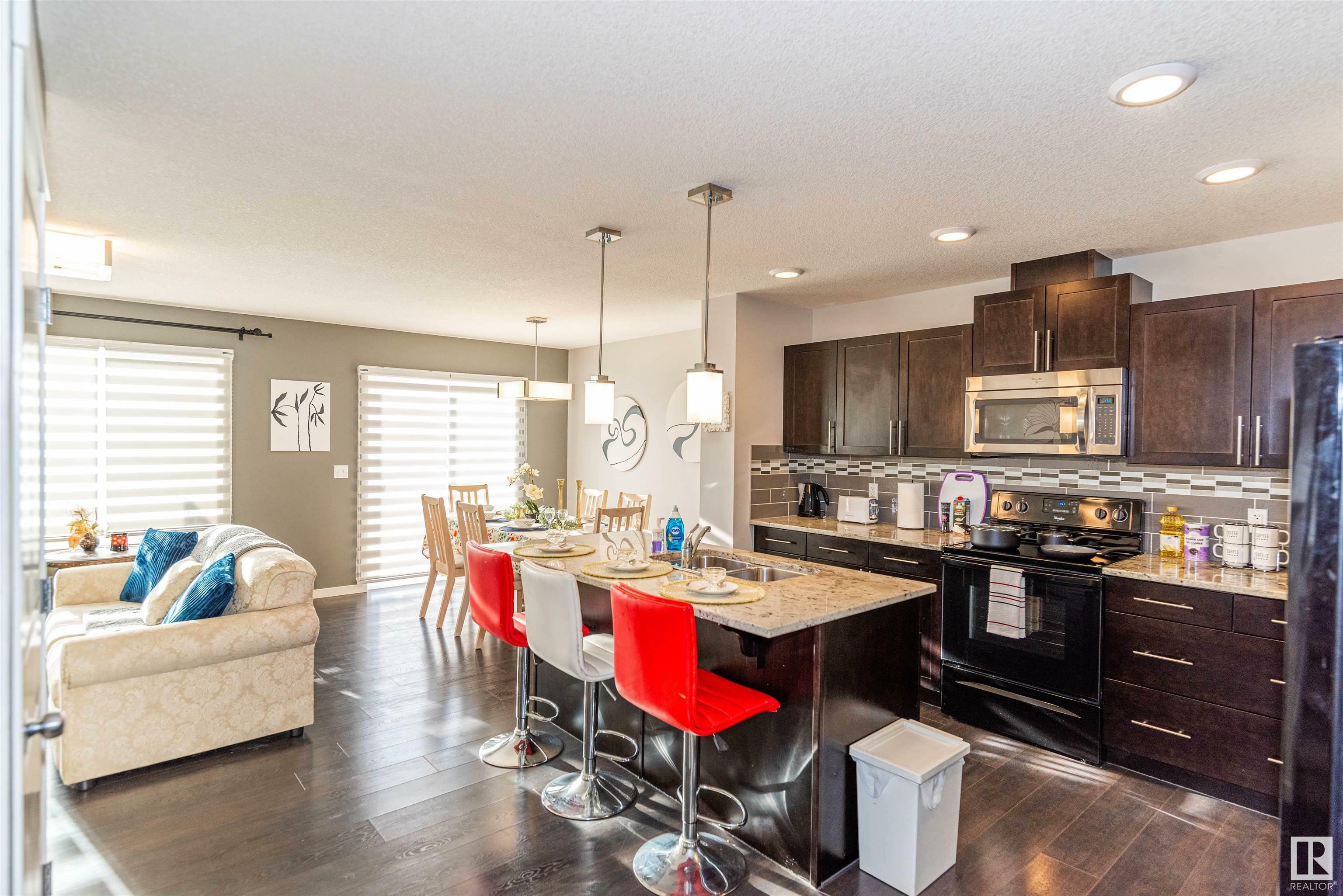 Property Photo: 5883 Anthony Crescent SW AB T6W 3H4