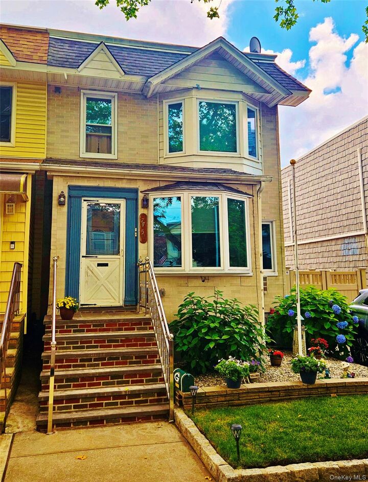 Property Photo:  77-52 76th Street  NY 11385 