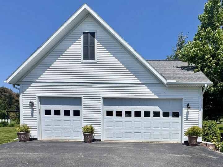 Property Photo: 7570 Bay Meadow Drive MI 49740