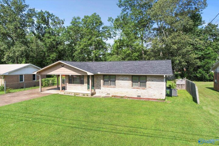 Property Photo:  322 Sharon Street  AL 35768 