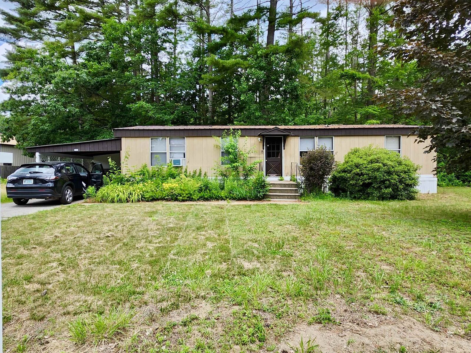 Property Photo: 12 Chickadee Court NH 03431