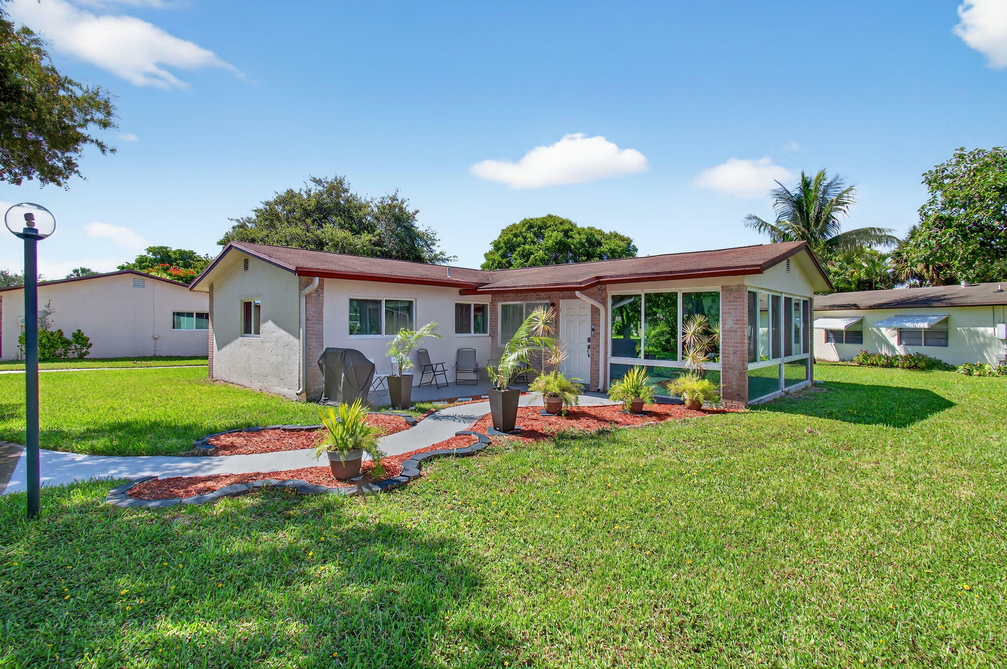 Property Photo:  2520 SW Natura Boulevard  FL 33441 