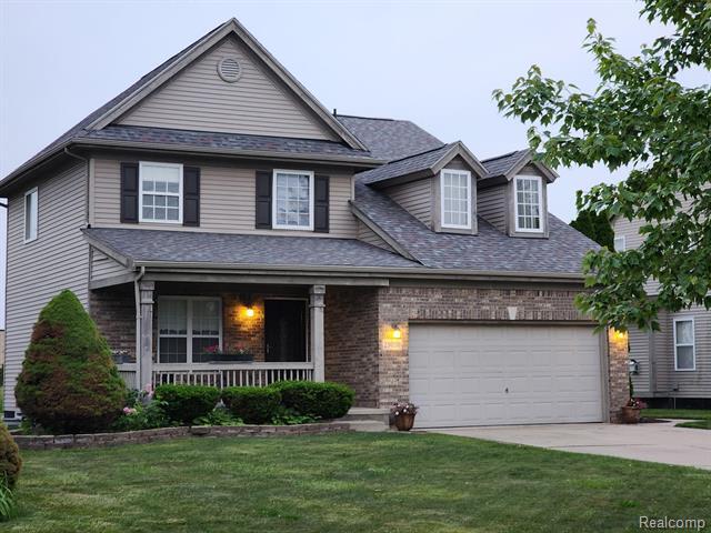 Property Photo:  25050 Constitution Avenue  MI 48089 