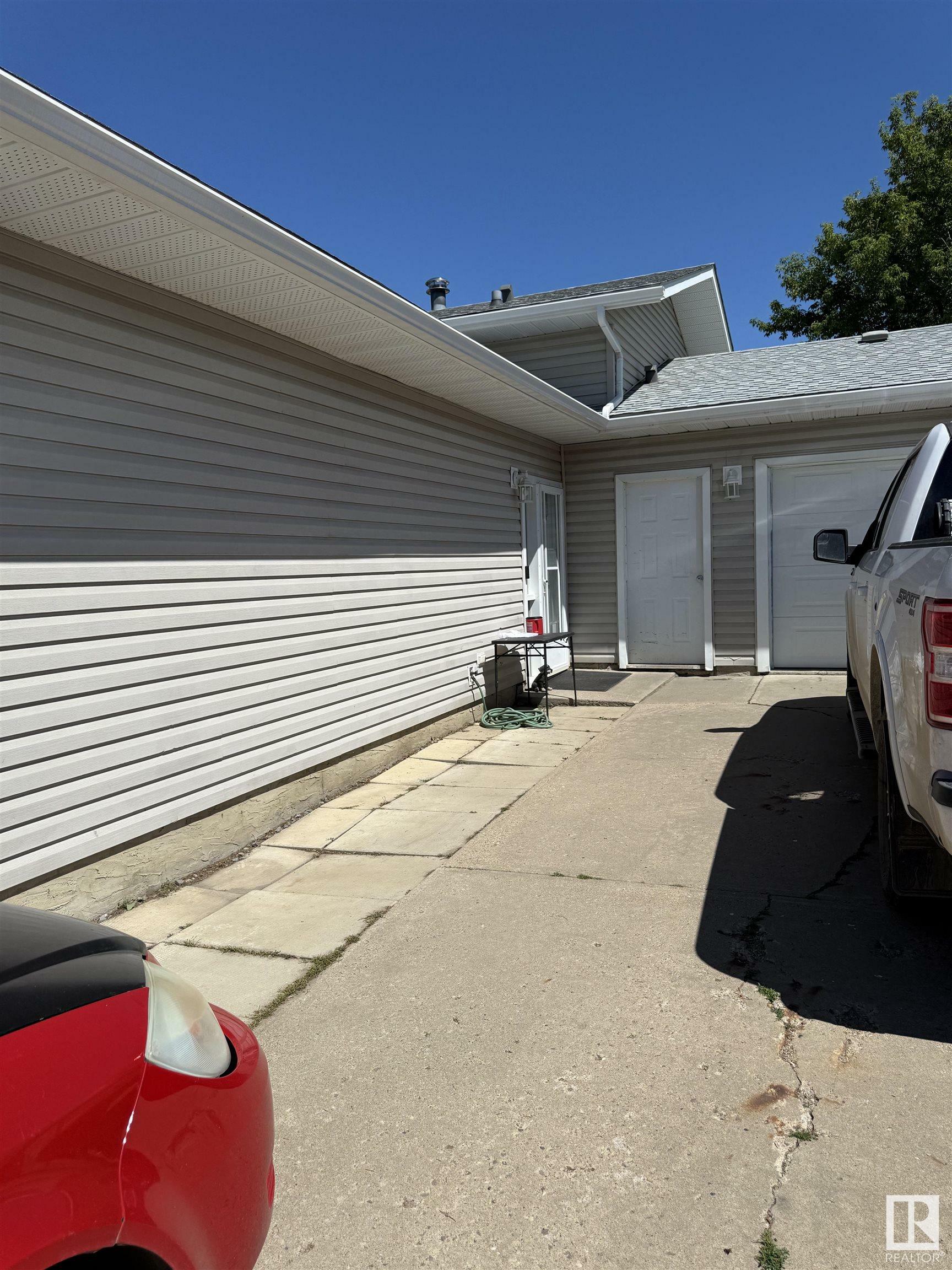 Property Photo: 5813 49 Street AB T9C 1H1