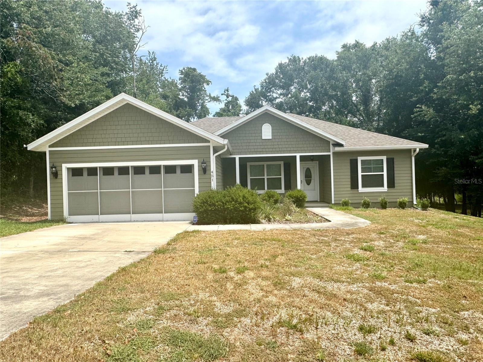 Property Photo: 451 NE 151 Terrace FL 32696