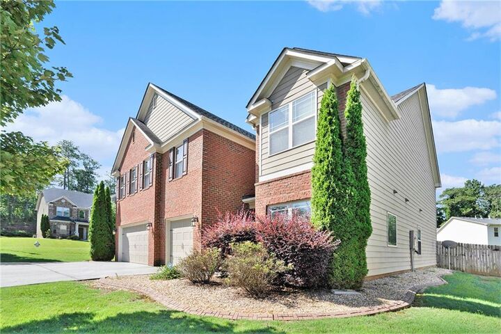 Property Photo: 5689 Woodland Greens Road GA 30135