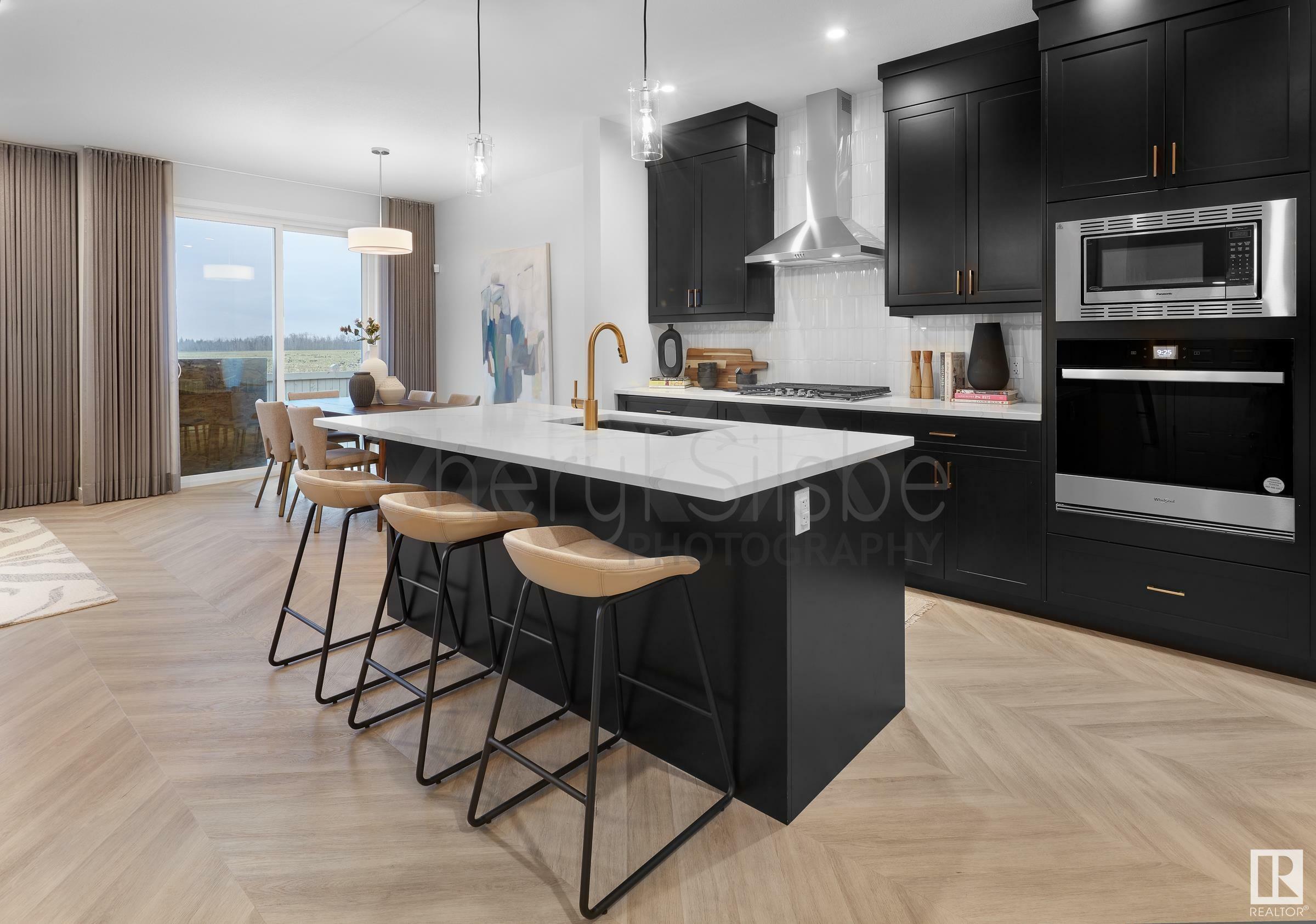 Property Photo: 3433 Craig Landing Landing SW AB T6W 5B3