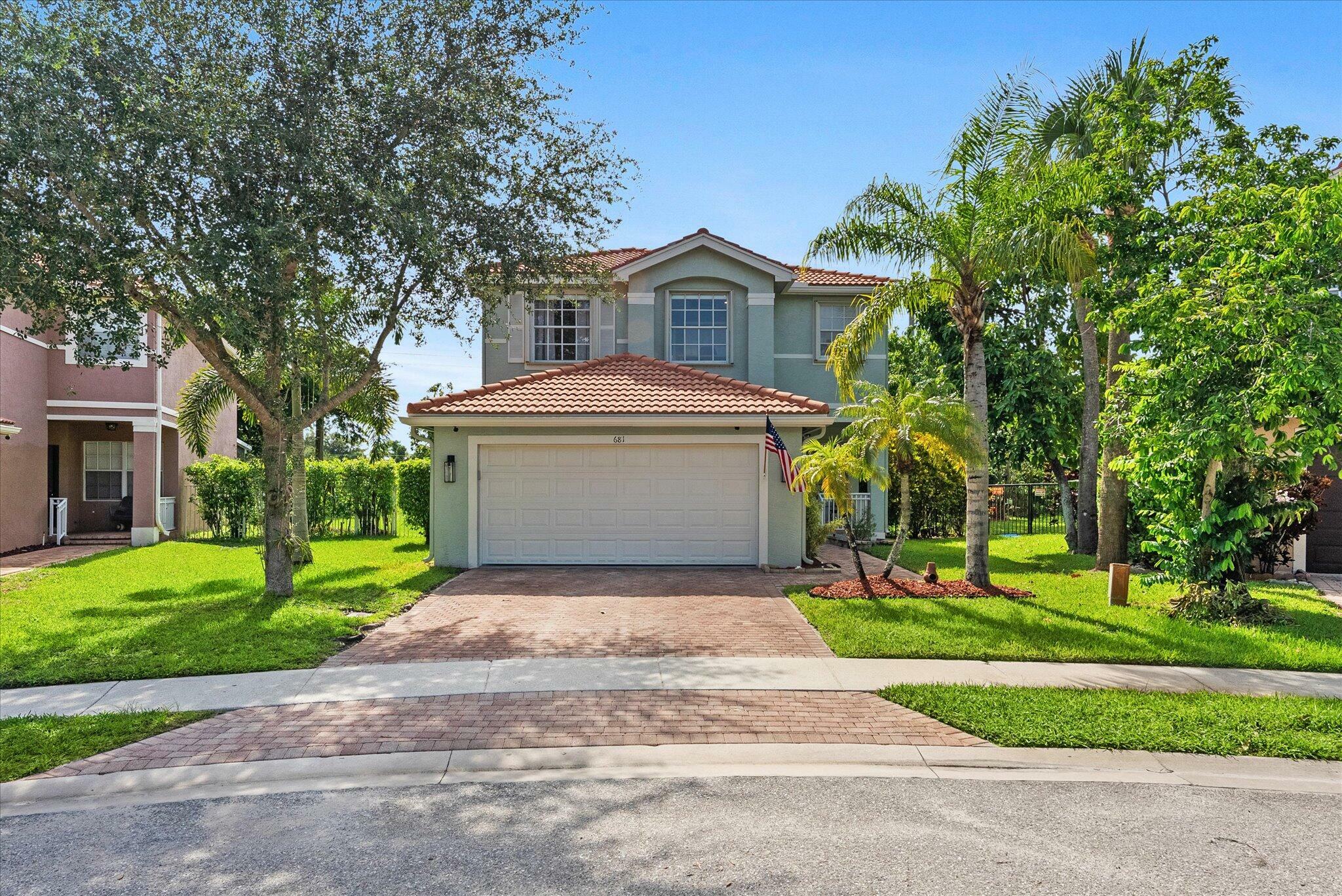 Property Photo: 681 Garden Cress Trail FL 33411