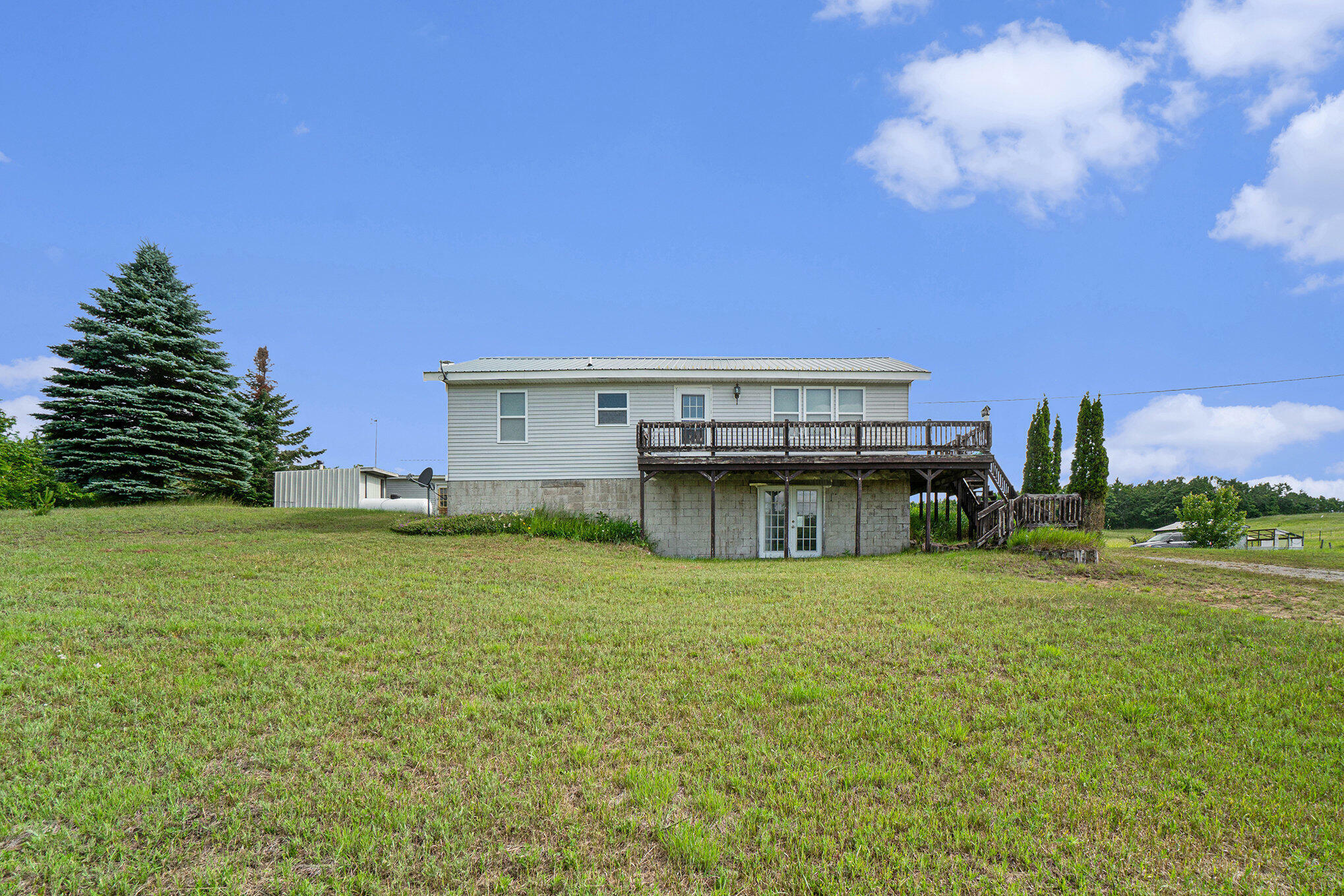 Property Photo: 1680 W Huffman Lake Road MI 49795