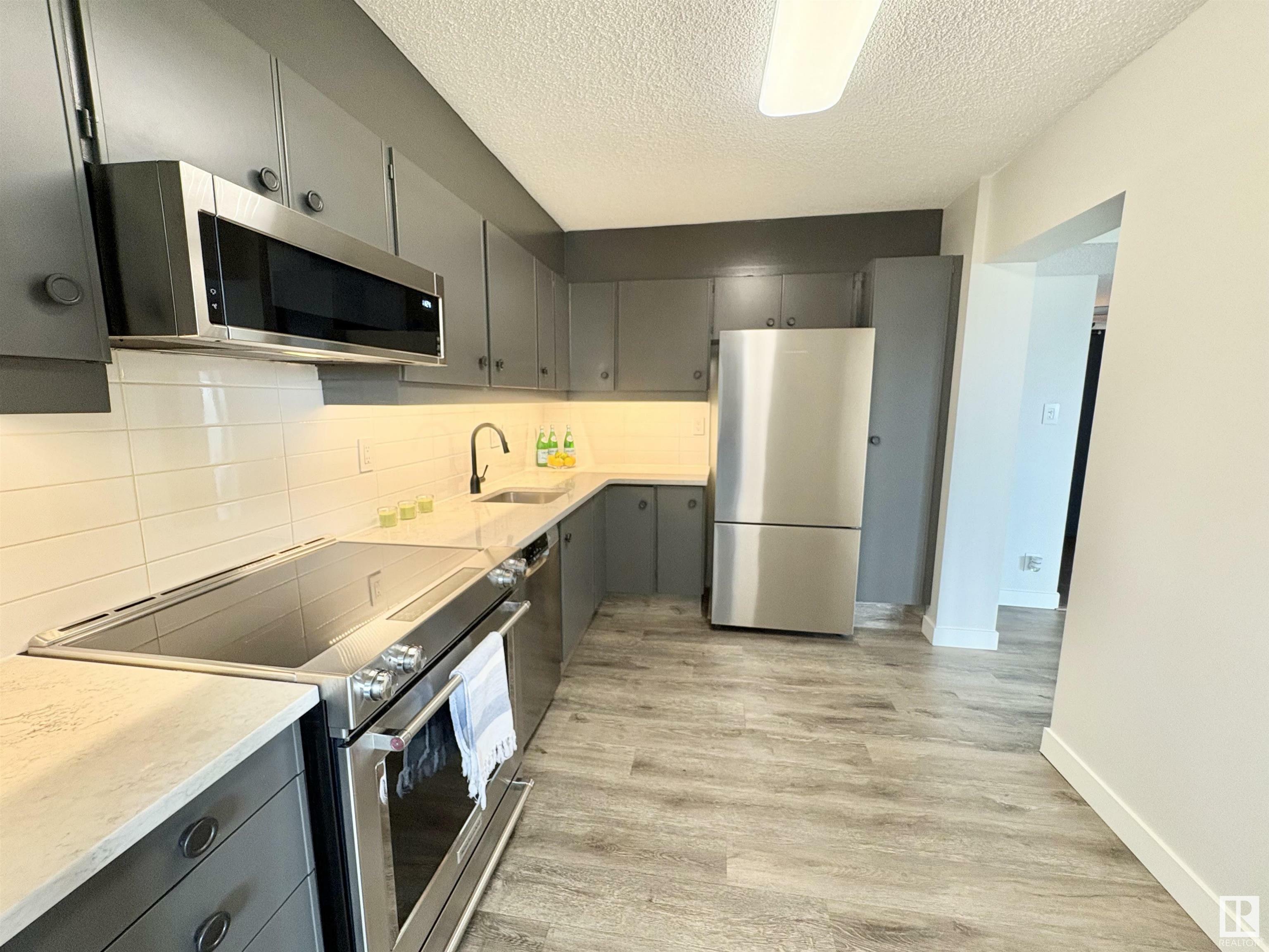 Property Photo: 8340 Jasper Avenue NW 1005 AB T5H 4C6
