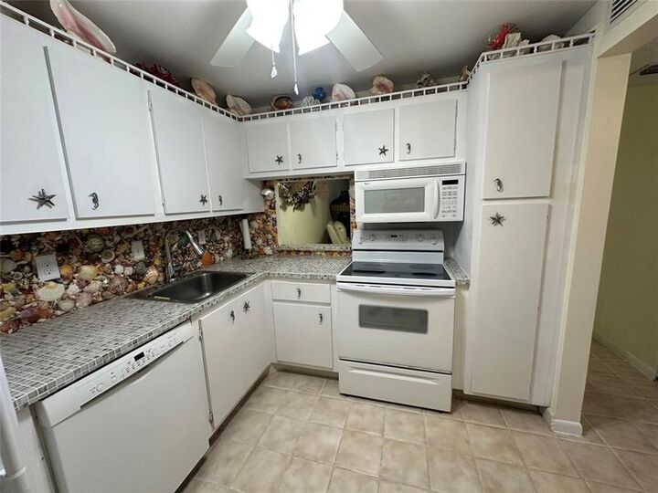 Property Photo: 3180 Holiday Springs Blvd 107 FL 33063