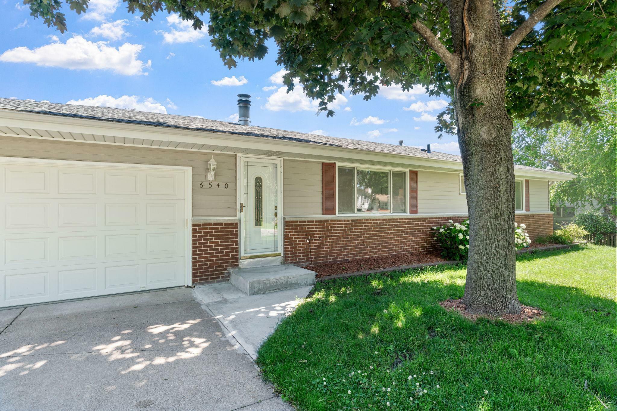 Property Photo: 6540 Zealand Avenue N MN 55428