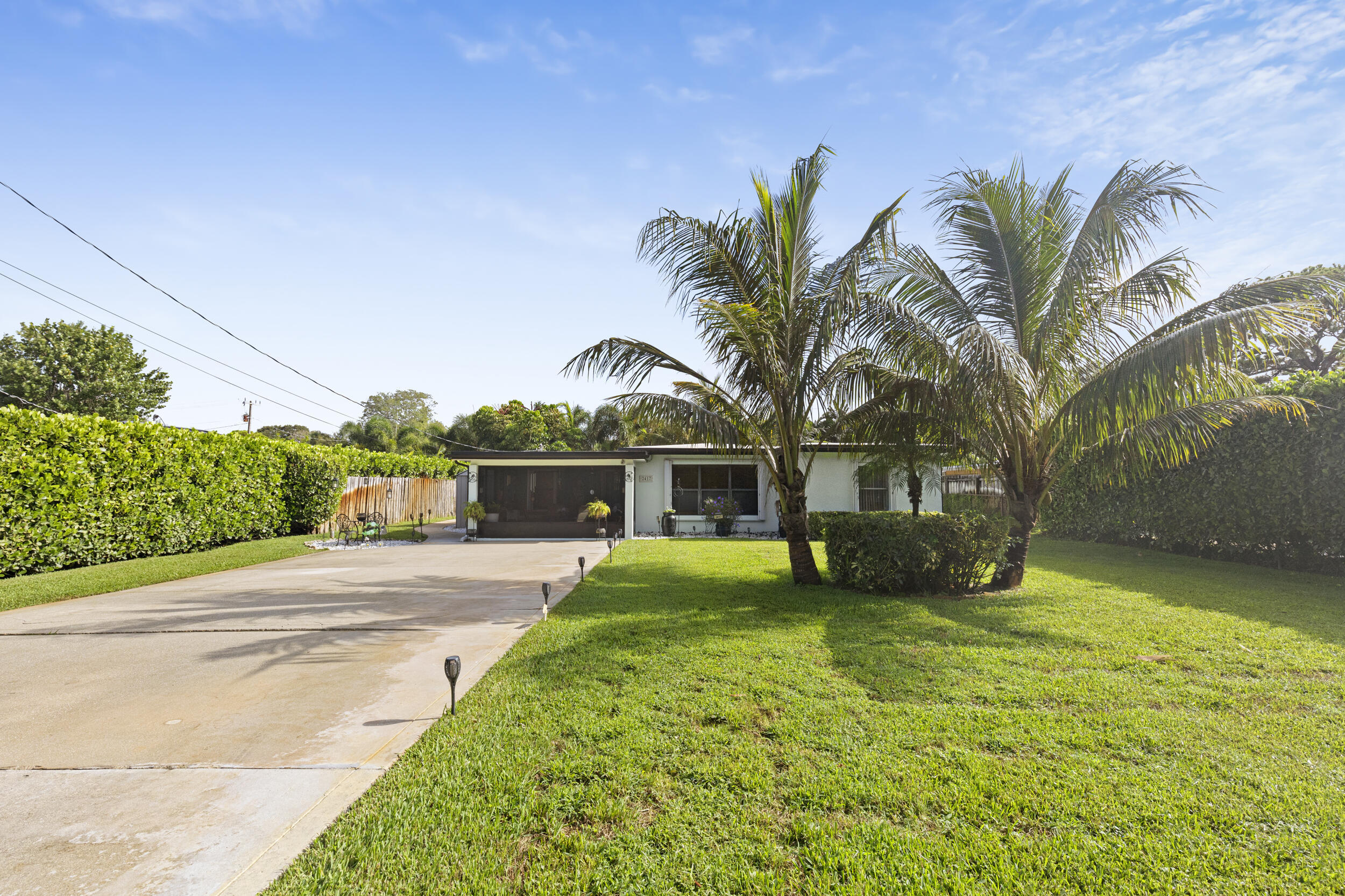 Property Photo: 2417 Country Oaks Lane FL 33410