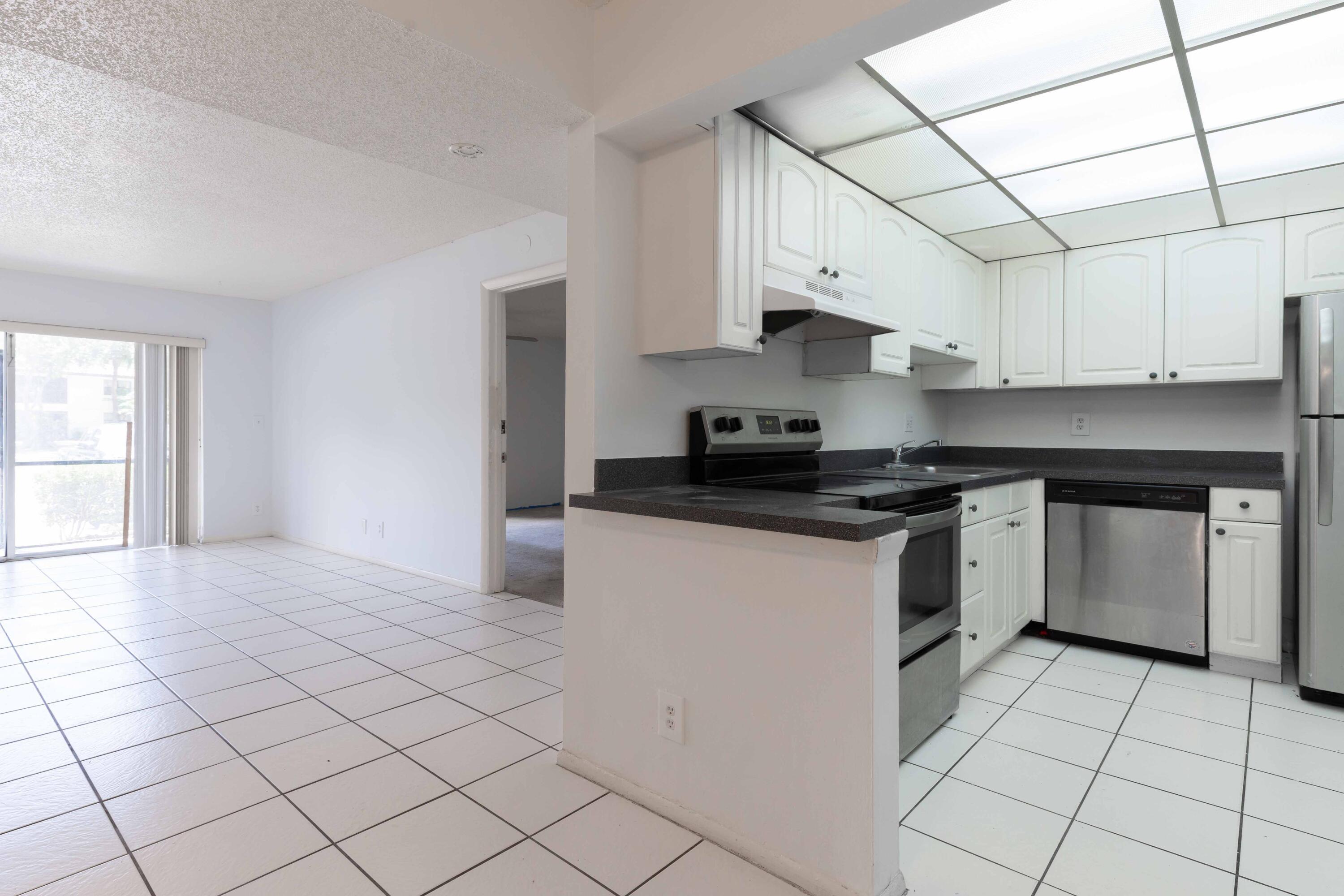 Property Photo: 490 NW 20th Street 1050 FL 33431