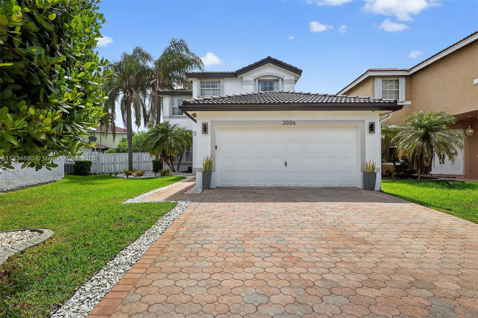 Property Photo: 2036 SW 159th Ave FL 33027