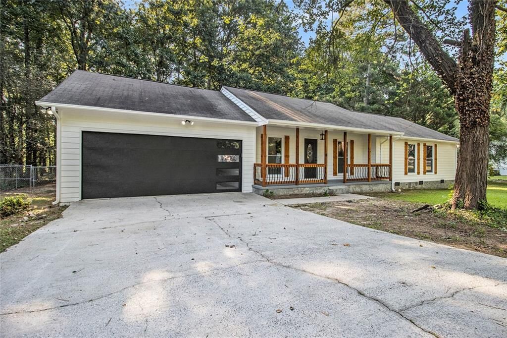Property Photo:  9344 Hidden Hollow Trail  GA 30236 