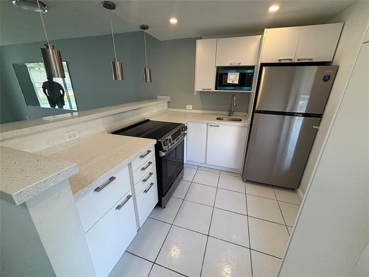 Property Photo: 6200 NW 62nd St 105 FL 33319
