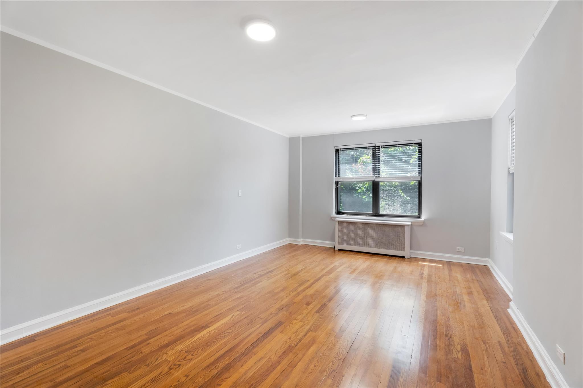 Property Photo: 84-39 153rd Avenue 1K NY 11414