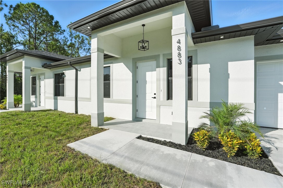 Property Photo:  4881/4883 Leonard Boulevard S  FL 33973 