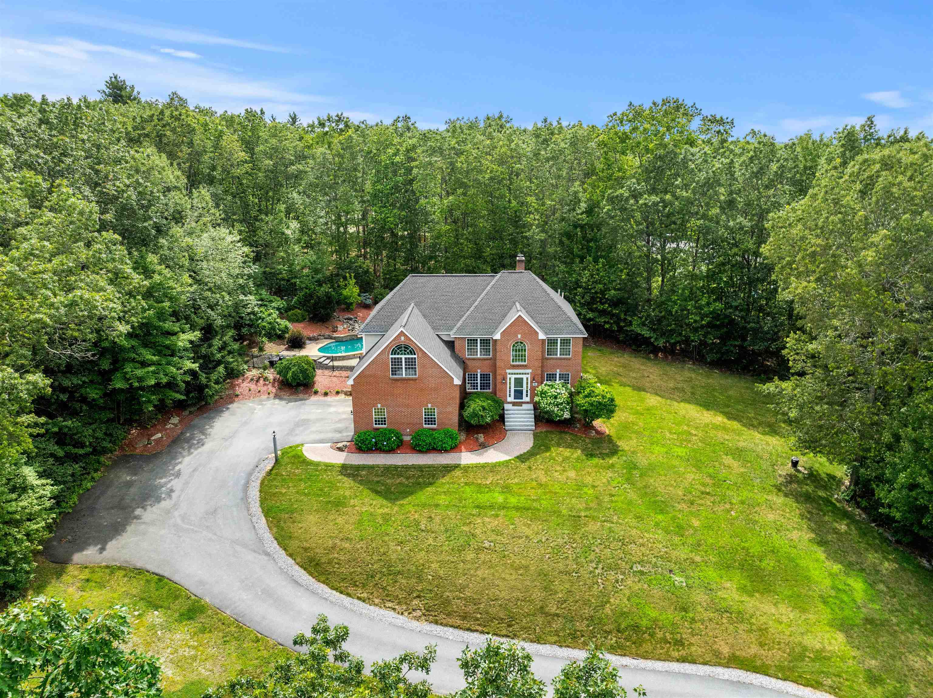 Property Photo: 60 Camelot Drive NH 03110