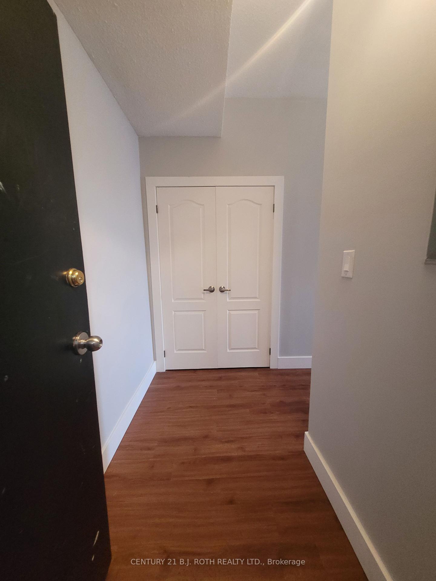 Property Photo: 19 Dunlop Street W 203 ON L4N 1A1
