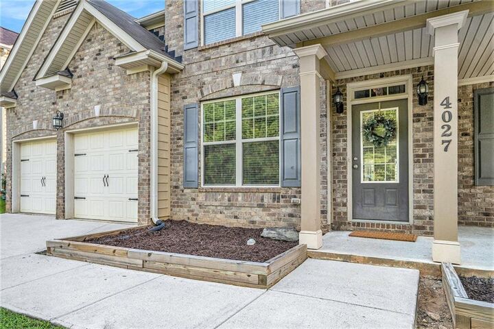 Property Photo:  4027 Dinmont Chase  GA 30349 