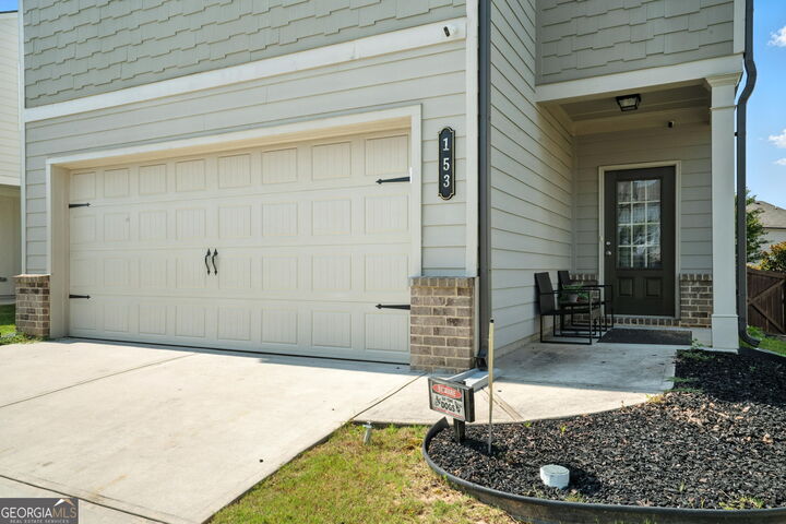 Property Photo:  153 Auburn Crossing Drive  GA 30011 